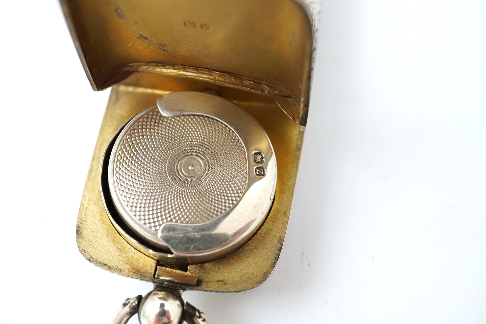 A late Victorian engraved silver oval combination sovereign and vesta case, by W H Tandy & Sons